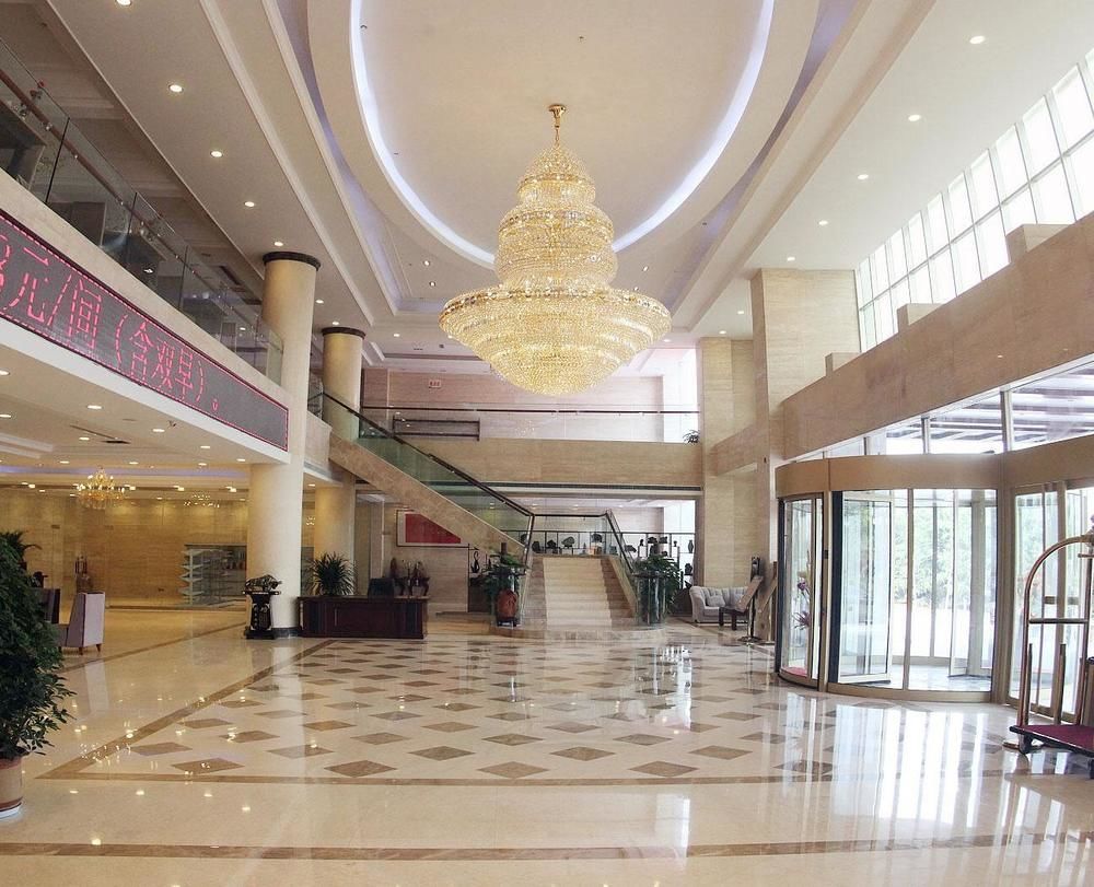 Weishi International Hotel Qing Zhou Extérieur photo