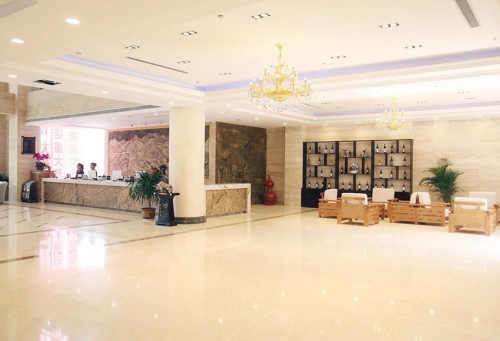 Weishi International Hotel Qing Zhou Extérieur photo