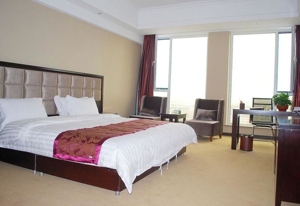 Weishi International Hotel Qing Zhou Extérieur photo