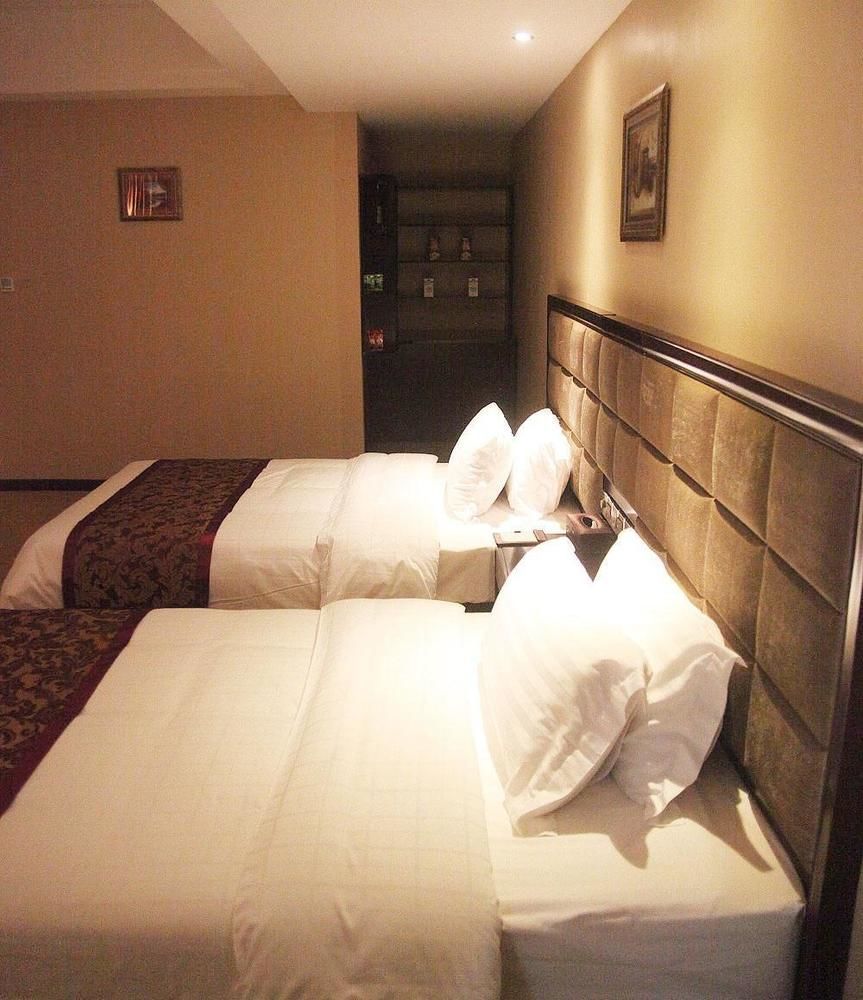 Weishi International Hotel Qing Zhou Extérieur photo