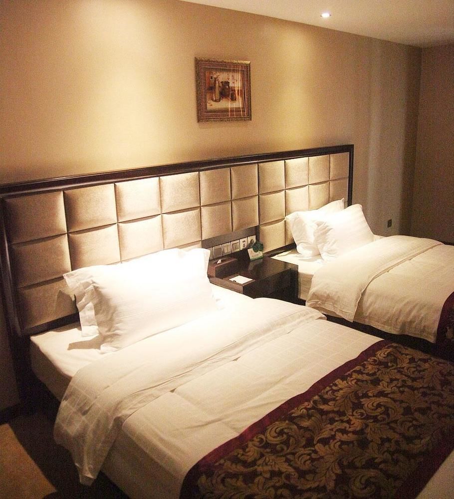 Weishi International Hotel Qing Zhou Extérieur photo