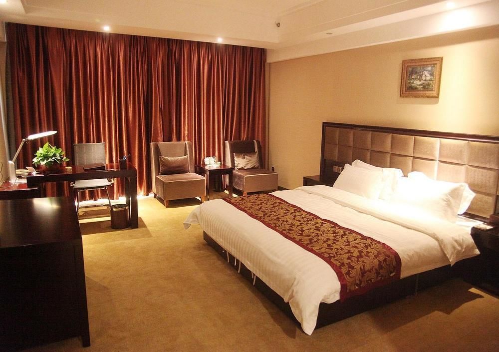 Weishi International Hotel Qing Zhou Extérieur photo