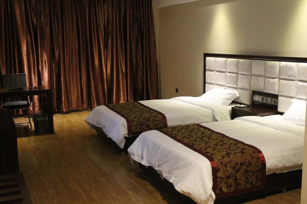 Weishi International Hotel Qing Zhou Extérieur photo
