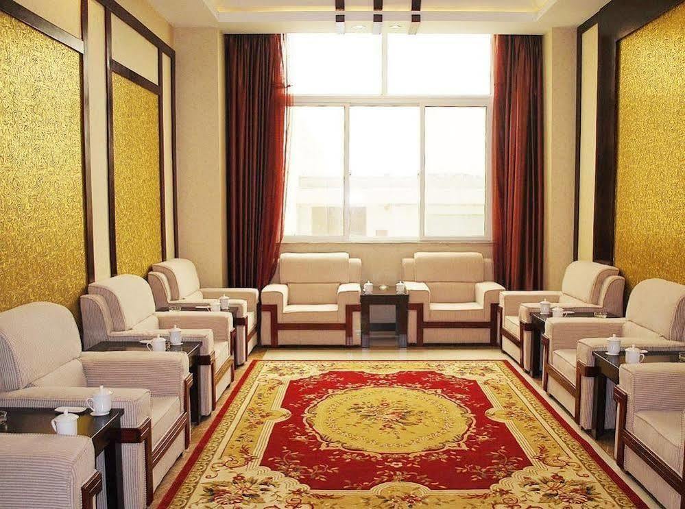 Weishi International Hotel Qing Zhou Extérieur photo